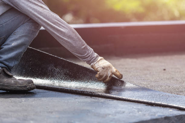 Professional Basement Waterproofing technician working in Marquette, WI
